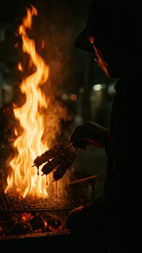 Street‑vendor skewers (dak‑kochi) dripping spicy sauce over charcoal, vendor silhouetted by flare of rising fire — documentary lens, gritty reportage aesthetic.